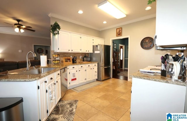 kitchen with white cabinets, sink, ceiling fan, kitchen peninsula, and stainless steel appliances