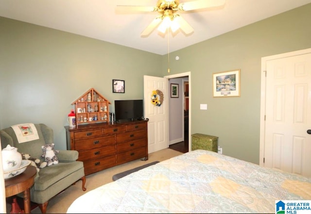 carpeted bedroom featuring ceiling fan