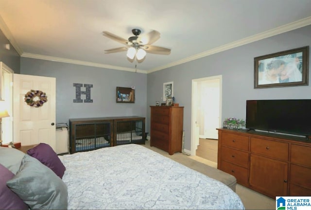 bedroom with ceiling fan, light carpet, and ornamental molding