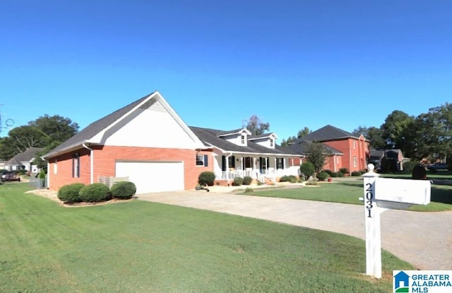 view of front of home with a garage and a front lawn