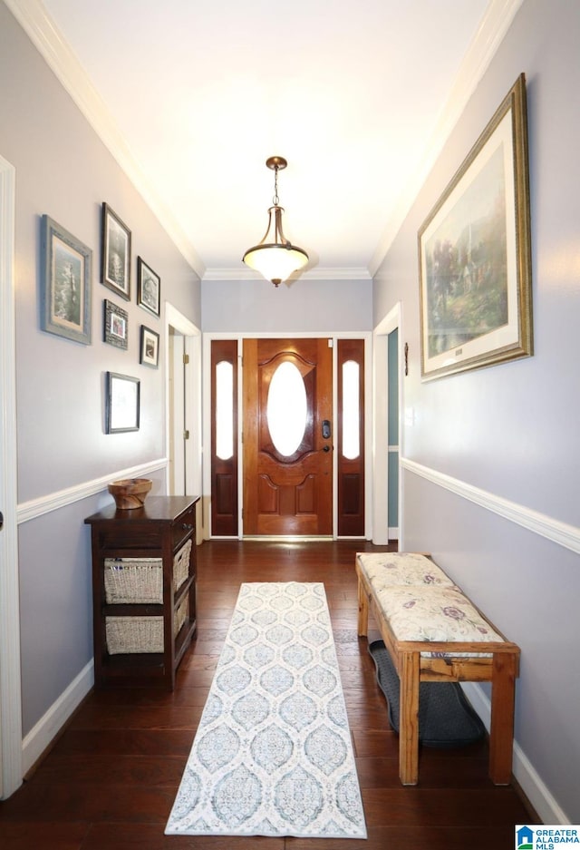 entrance foyer featuring dark hardwood / wood-style flooring and crown molding