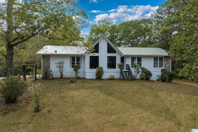 view of front of property with a front lawn