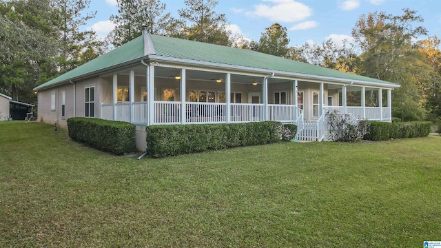 country-style home featuring a front yard