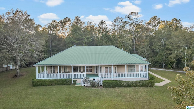 country-style home featuring a front yard and a porch