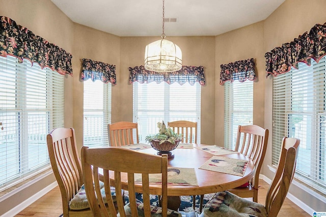 dining area with light hardwood / wood-style flooring