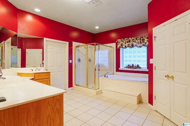 bathroom with vanity, separate shower and tub, and tile patterned flooring