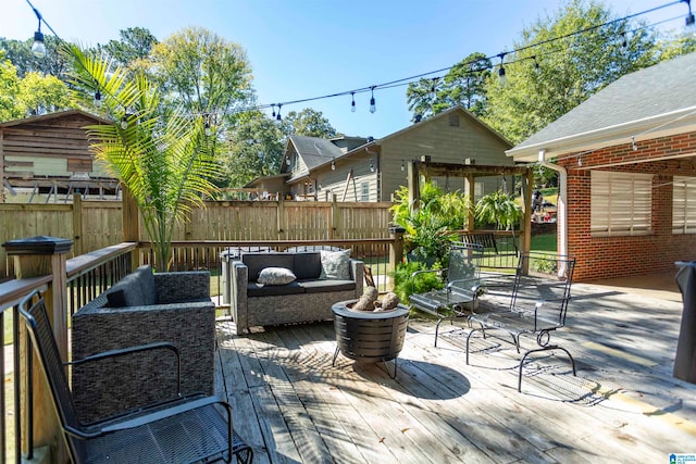 wooden terrace featuring an outdoor hangout area