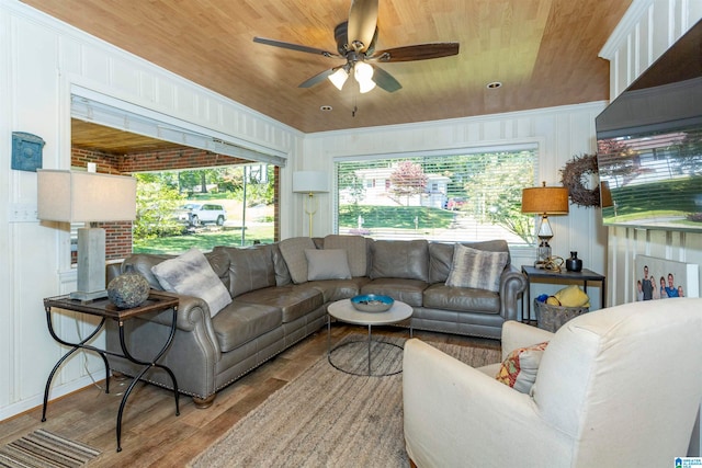 living room with wood ceiling, light wood-type flooring, and ceiling fan