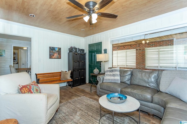 living room with wood ceiling, hardwood / wood-style floors, a healthy amount of sunlight, and ceiling fan