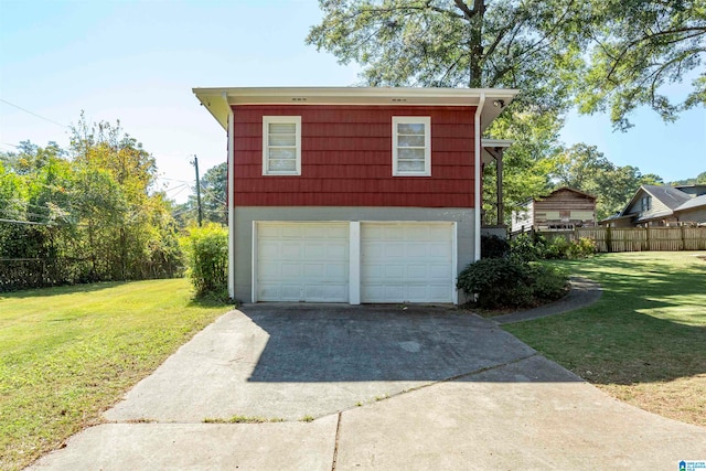 garage with a lawn