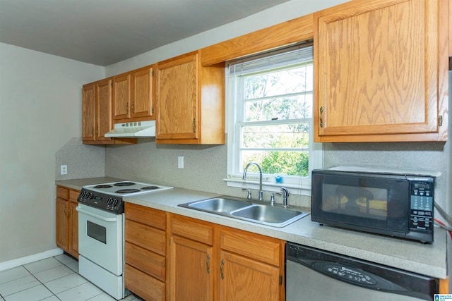 kitchen with dishwasher, white electric range oven, sink, and light tile patterned floors