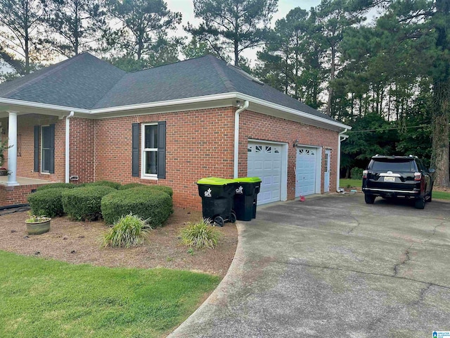 view of property exterior featuring a garage