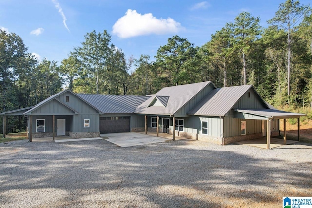 view of front of home with a carport