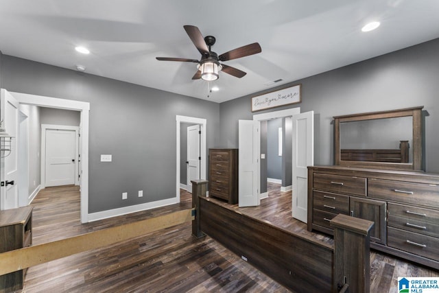 bedroom with dark wood-type flooring and ceiling fan