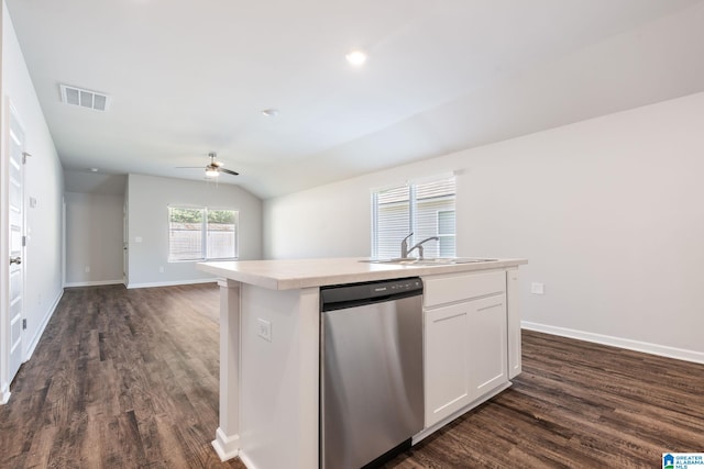 kitchen with dishwasher, a kitchen island with sink, white cabinets, vaulted ceiling, and dark hardwood / wood-style flooring