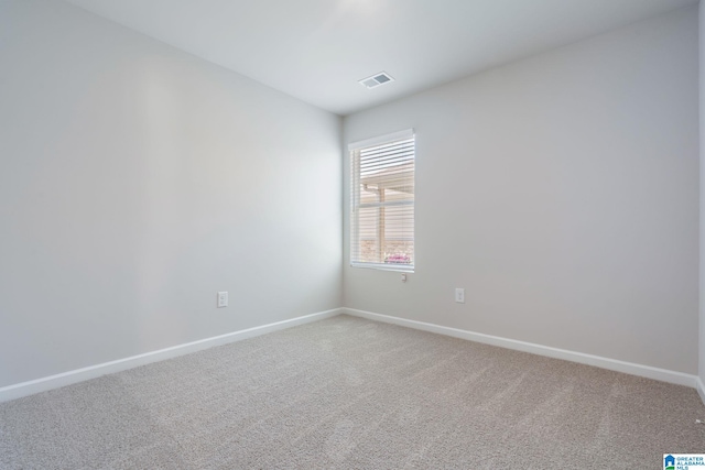 view of carpeted spare room