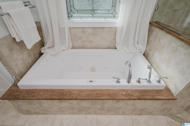 bathroom with tiled tub