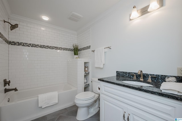 full bathroom featuring tiled shower / bath, vanity, ornamental molding, and toilet