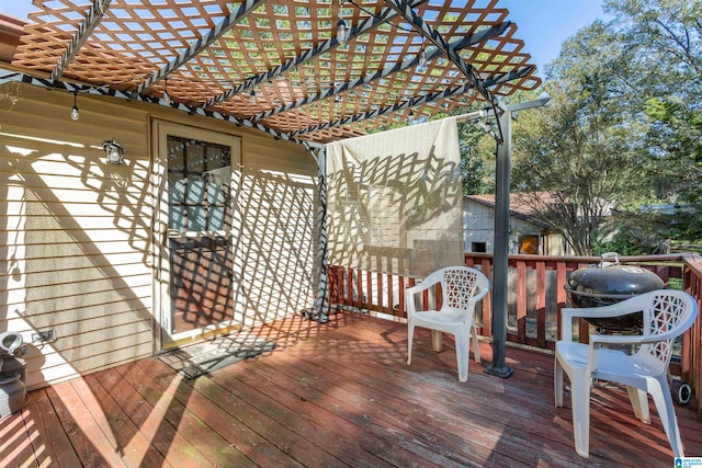 wooden terrace with a pergola