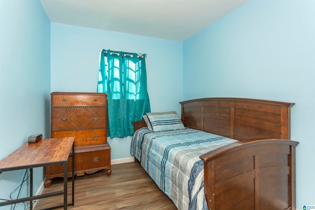 bedroom featuring hardwood / wood-style floors