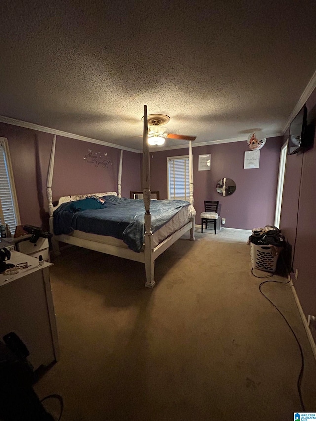 carpeted bedroom with ornamental molding, a textured ceiling, and ceiling fan