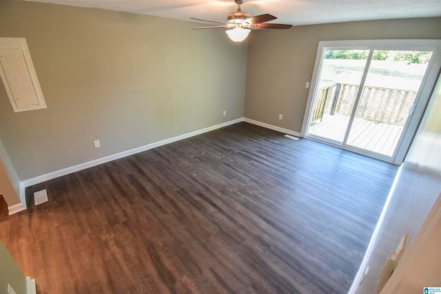 unfurnished room featuring ceiling fan and dark hardwood / wood-style flooring