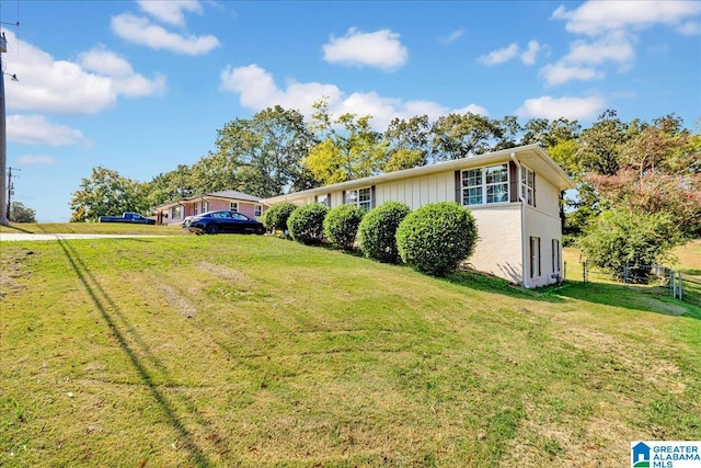 view of property exterior featuring a yard