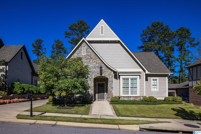 view of front of home with a front lawn