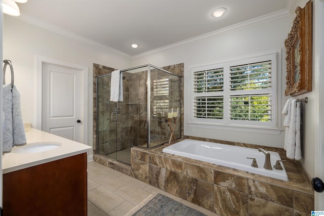 bathroom featuring vanity, crown molding, and independent shower and bath