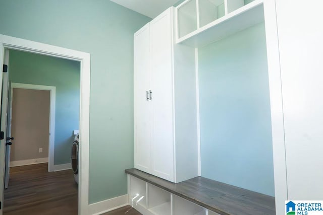 mudroom featuring dark wood-type flooring and washer / clothes dryer