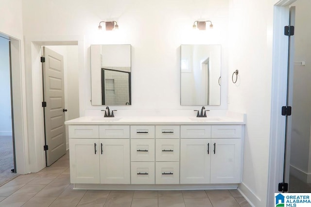 bathroom featuring vanity and tile patterned flooring