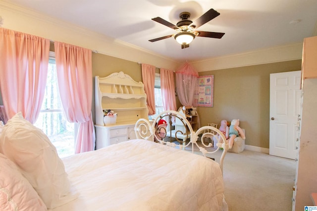 bedroom with ceiling fan, light carpet, and ornamental molding