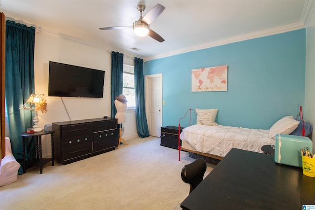 bedroom featuring light carpet, crown molding, and ceiling fan