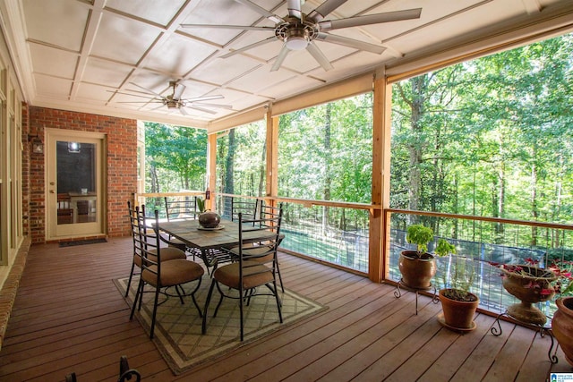 wooden terrace featuring ceiling fan