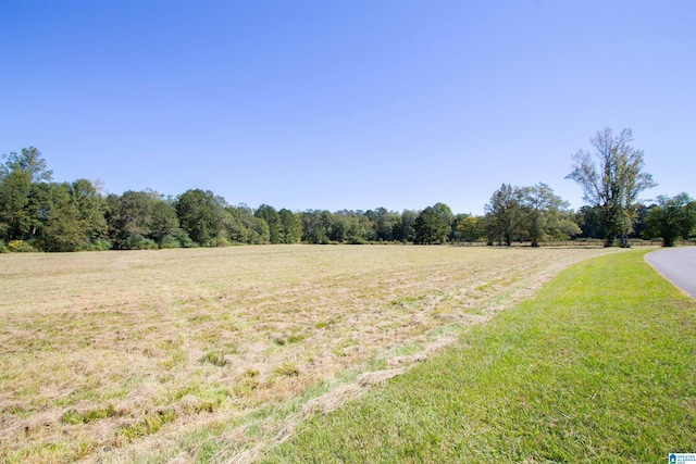 exterior space with a rural view