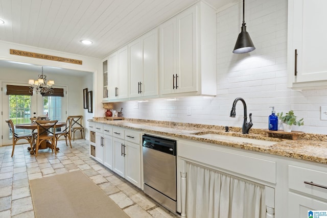 kitchen featuring light stone counters, dishwasher, white cabinets, hanging light fixtures, and sink