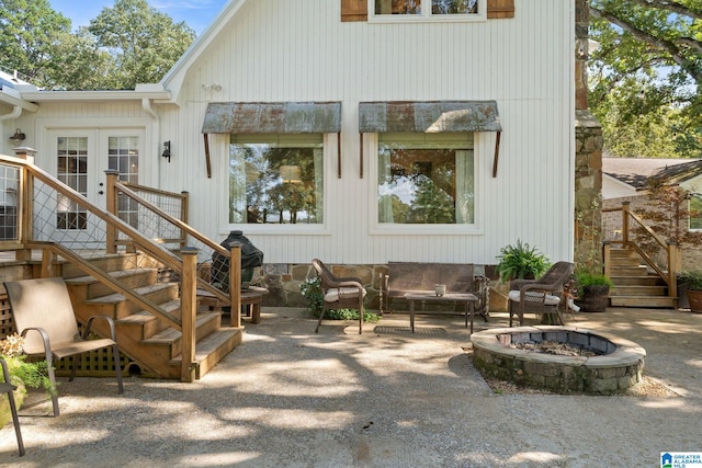 view of patio / terrace with an outdoor fire pit