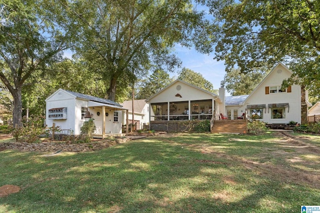 view of yard with a sunroom