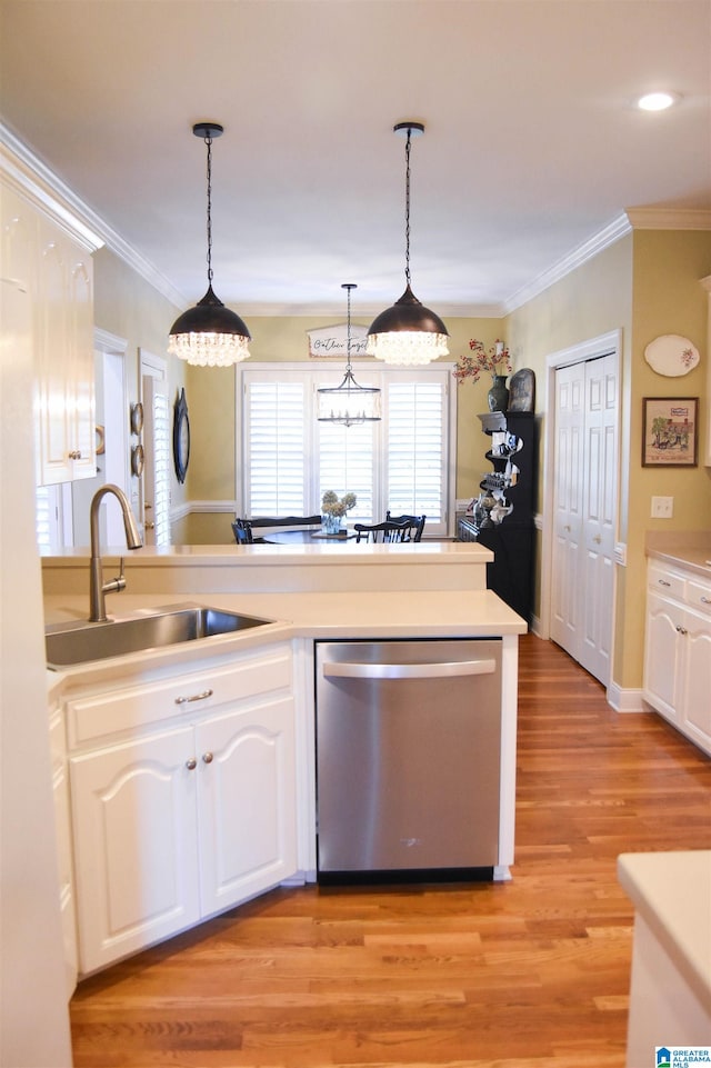 kitchen with light hardwood / wood-style floors, dishwasher, sink, and white cabinetry