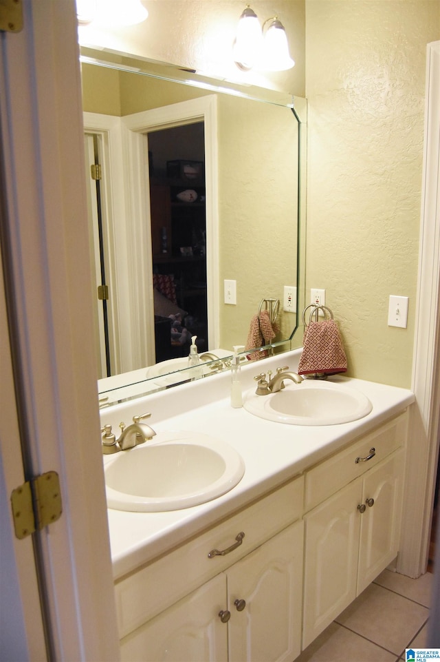 bathroom with vanity and tile patterned floors