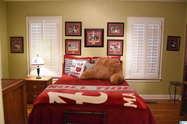 bedroom featuring hardwood / wood-style flooring