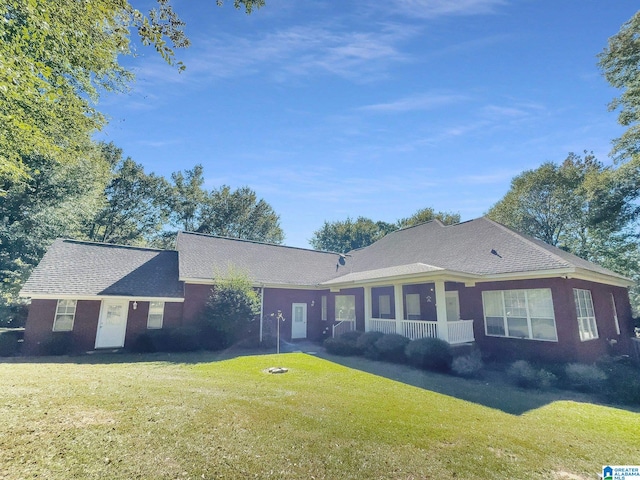 single story home with a front yard