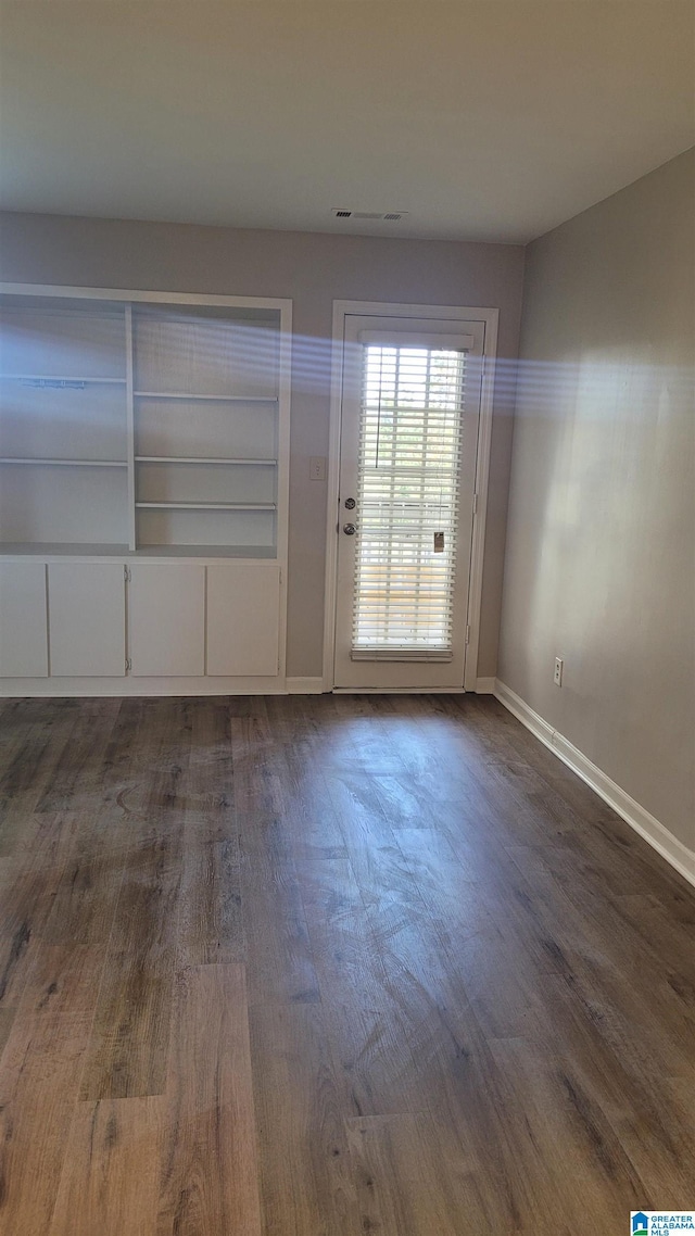 211 Morning Sun Dr Unit 211, Birmingham, AL 35242 - spare room featuring dark wood-style floors and baseboards