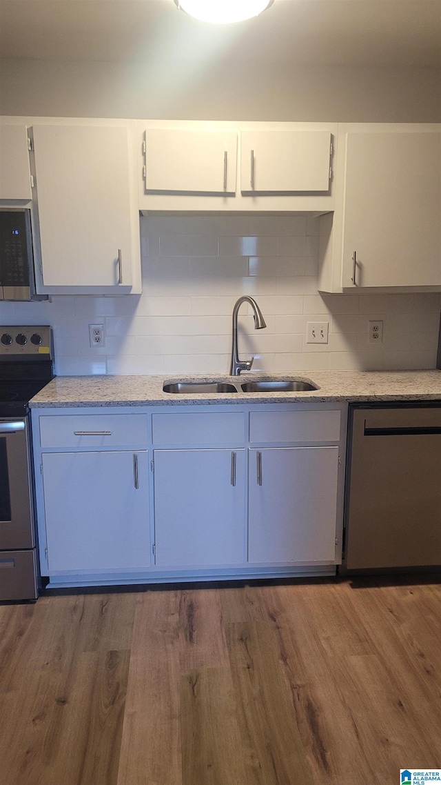 211 Morning Sun Dr Unit 211, Birmingham, AL 35242 - kitchen with stainless steel appliances, a sink, backsplash, and dark wood-style floors