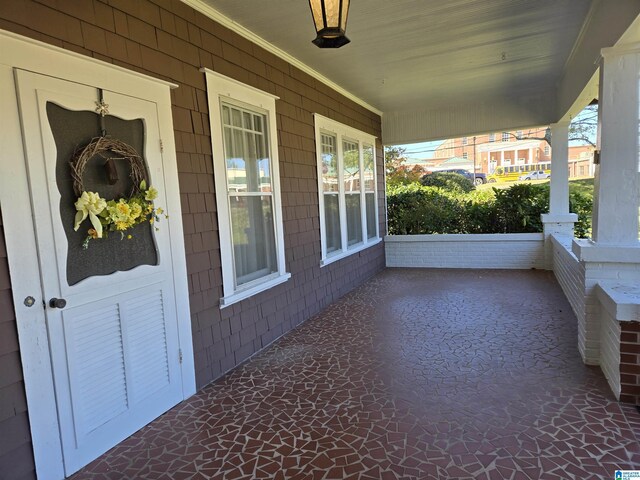 view of patio featuring covered porch