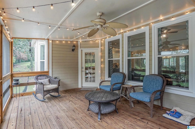 sunroom / solarium with ceiling fan