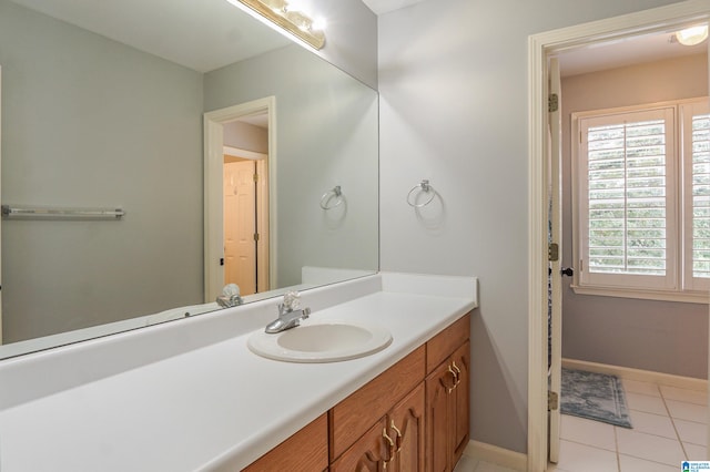 bathroom with vanity and tile patterned flooring