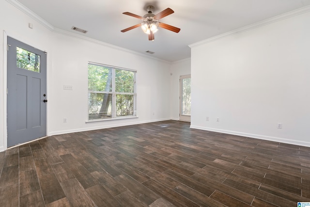 entrance foyer featuring crown molding, dark hardwood / wood-style floors, a healthy amount of sunlight, and ceiling fan