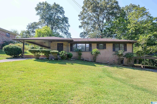 520 Hickory St, Birmingham, AL 35206 - single story home with brick siding, driveway, a front lawn, and a carport