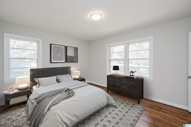 520 Hickory St, Birmingham, AL 35206 - bedroom with baseboards and wood finished floors